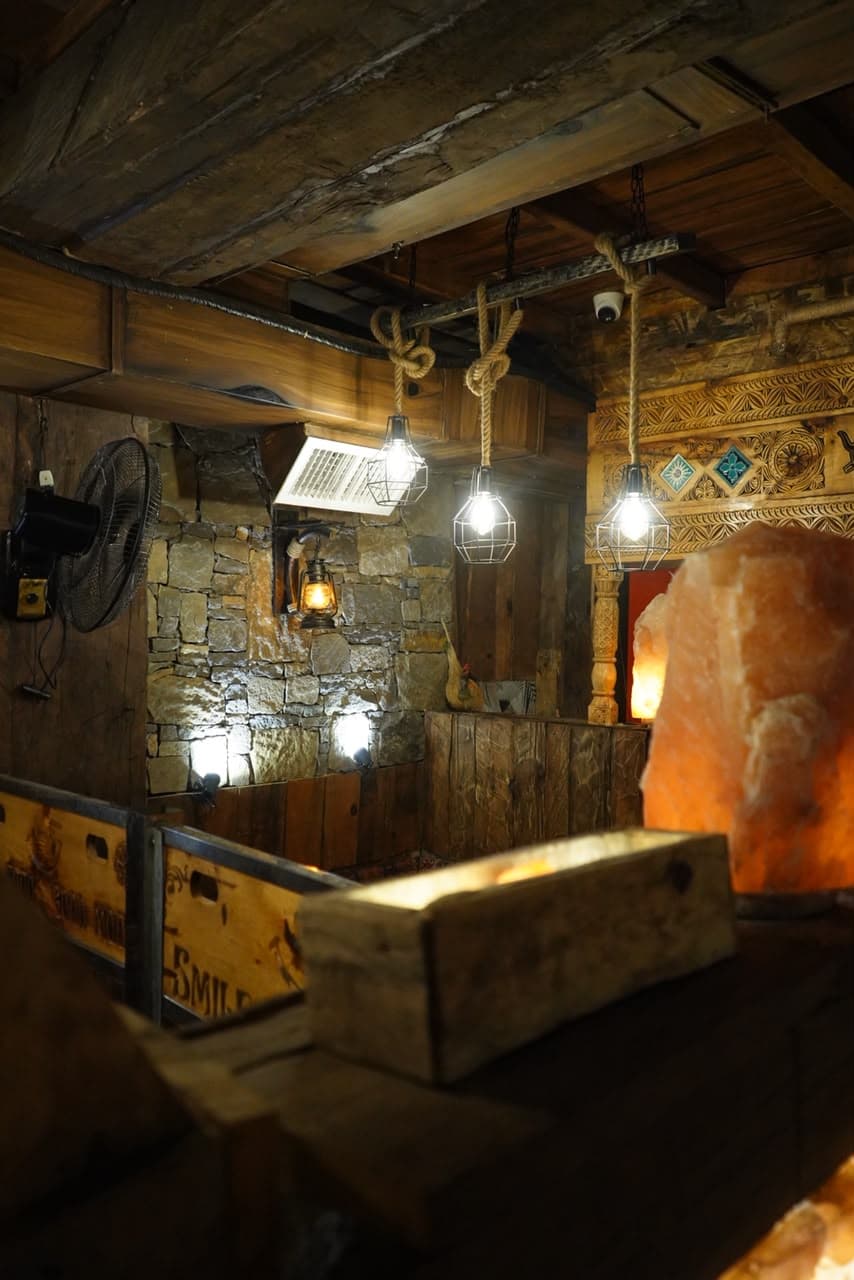 Himalayan salt decor and ambient glow at Fire n Steakhouse Bahria Town